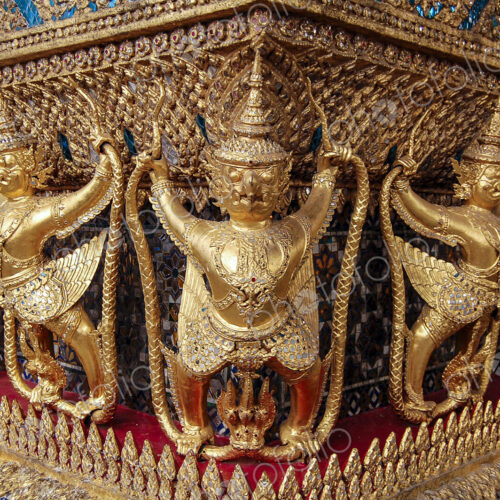 Statues frieze at the golden shrine at Wat Pho Buddhist temple Statues frieze at the golden shrine at Wat Pho Buddhist temple