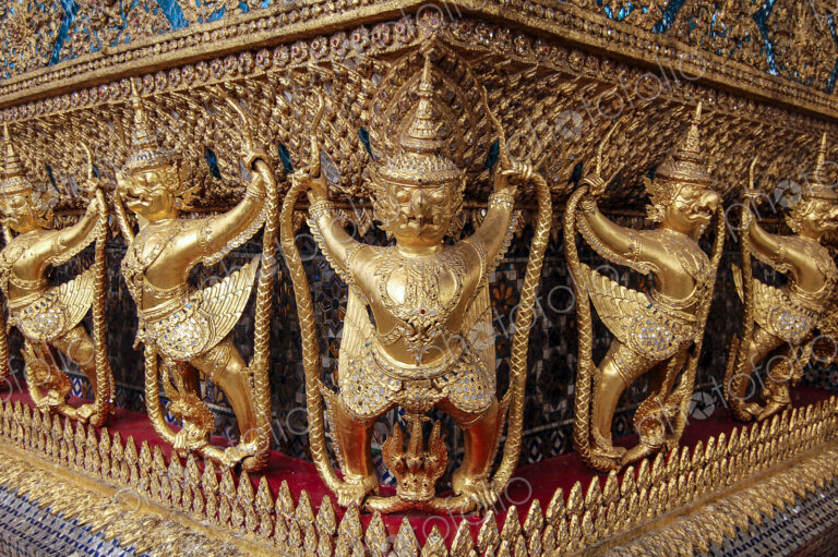 Statues frieze at the golden shrine at Wat Pho Buddhist temple