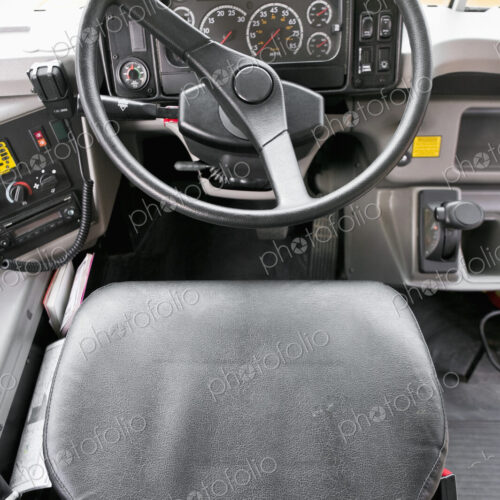 Steering wheel in old fashioned car or vehicle. Steering wheel in old fashioned car or vehicle.