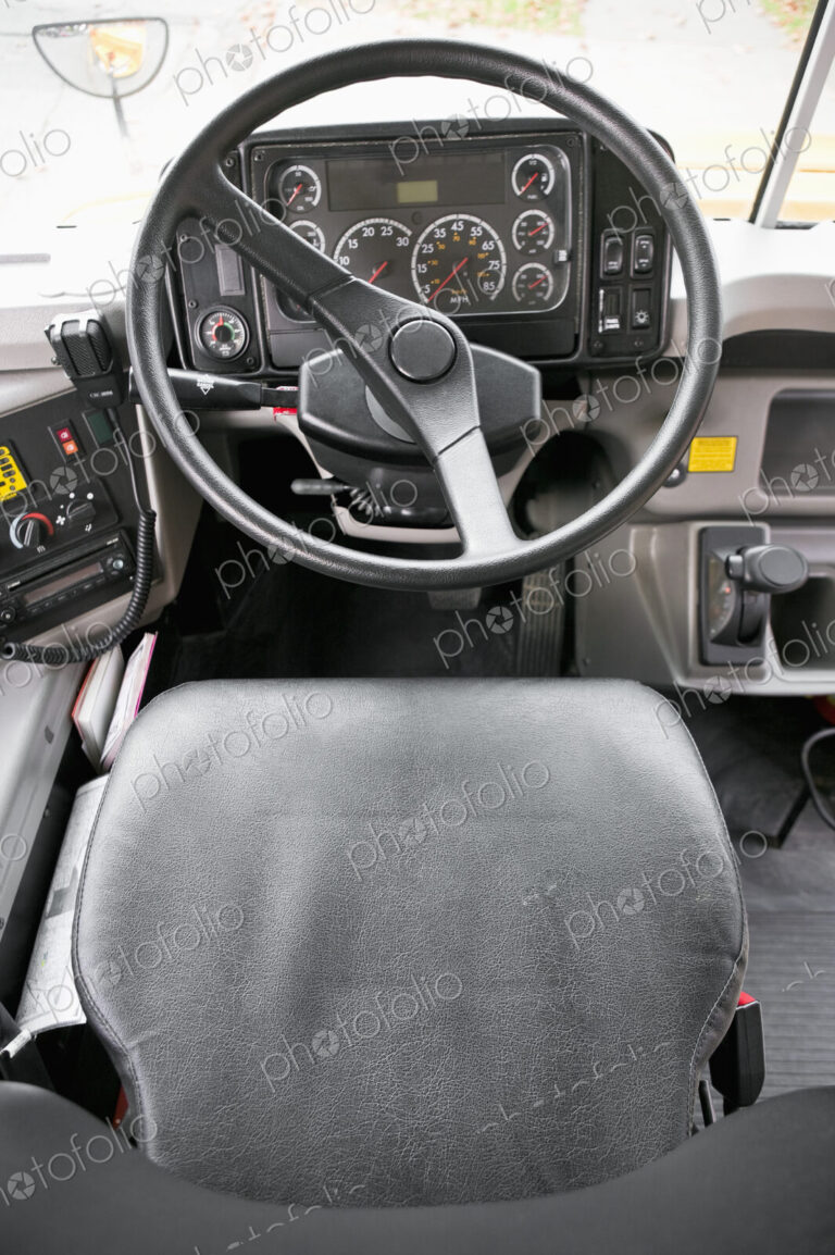 Steering wheel in old fashioned car or vehicle.