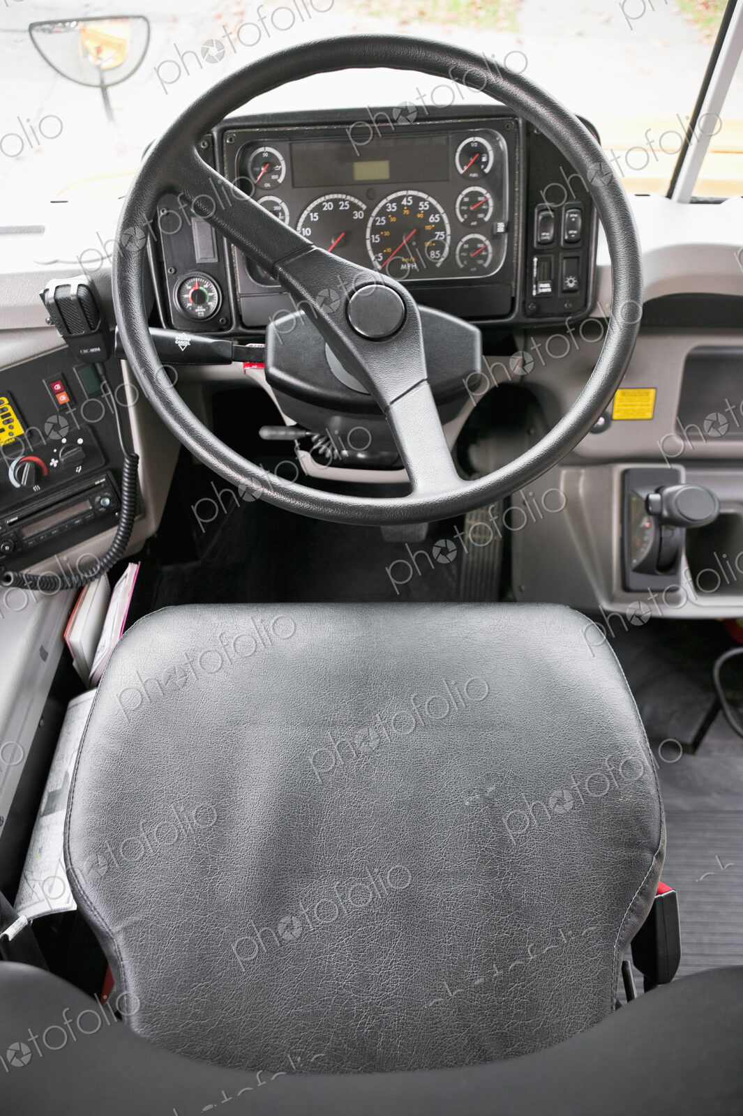 Steering wheel in old fashioned car or vehicle.
