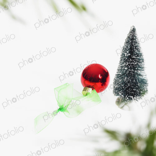 Still life. Green leaf foliage and decorations. A pine tree branch with green needles.… Still life. Green leaf foliage and decorations. A pine tree branch with green needles.…