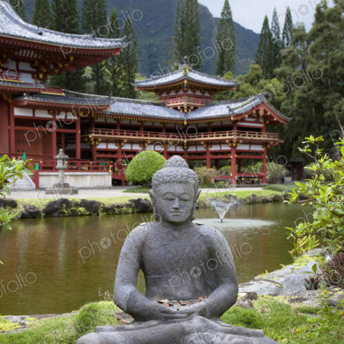 Stone Buddha in Front of Temple Stone Buddha in Front of Temple