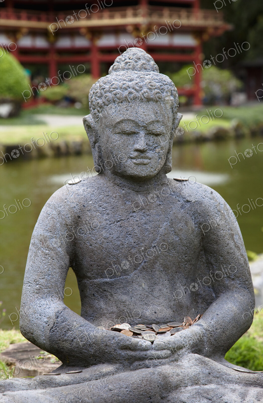 Stone Buddha with Offerings