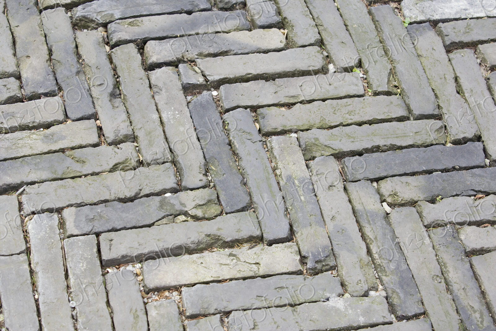Stone Paving, paid in a herringbone pattern