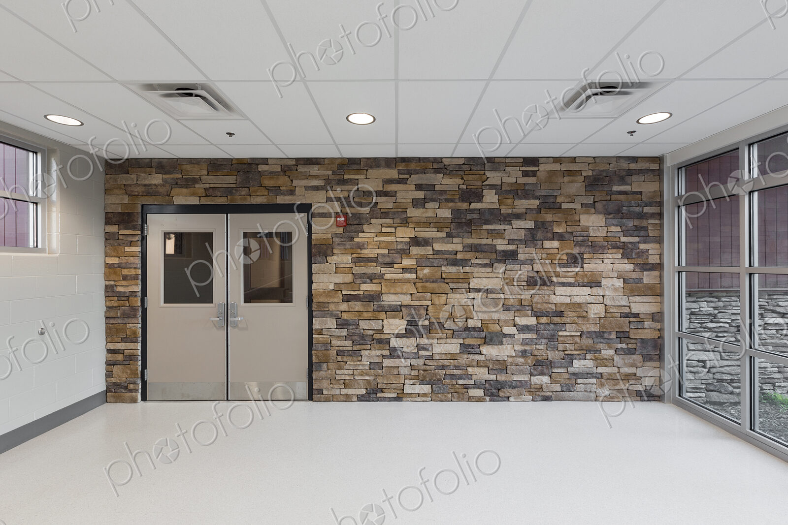Stone wall in lobby of animal shelter