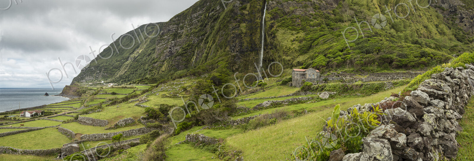 Stone walls between fields in rural landscape