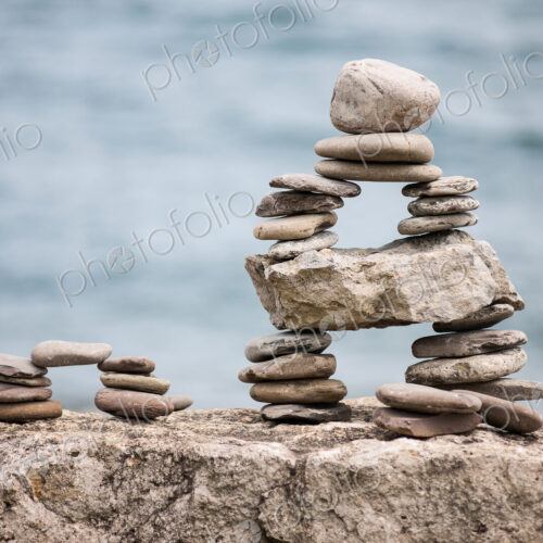 Stones piled up with ocean beyond. Stones piled up with ocean beyond.