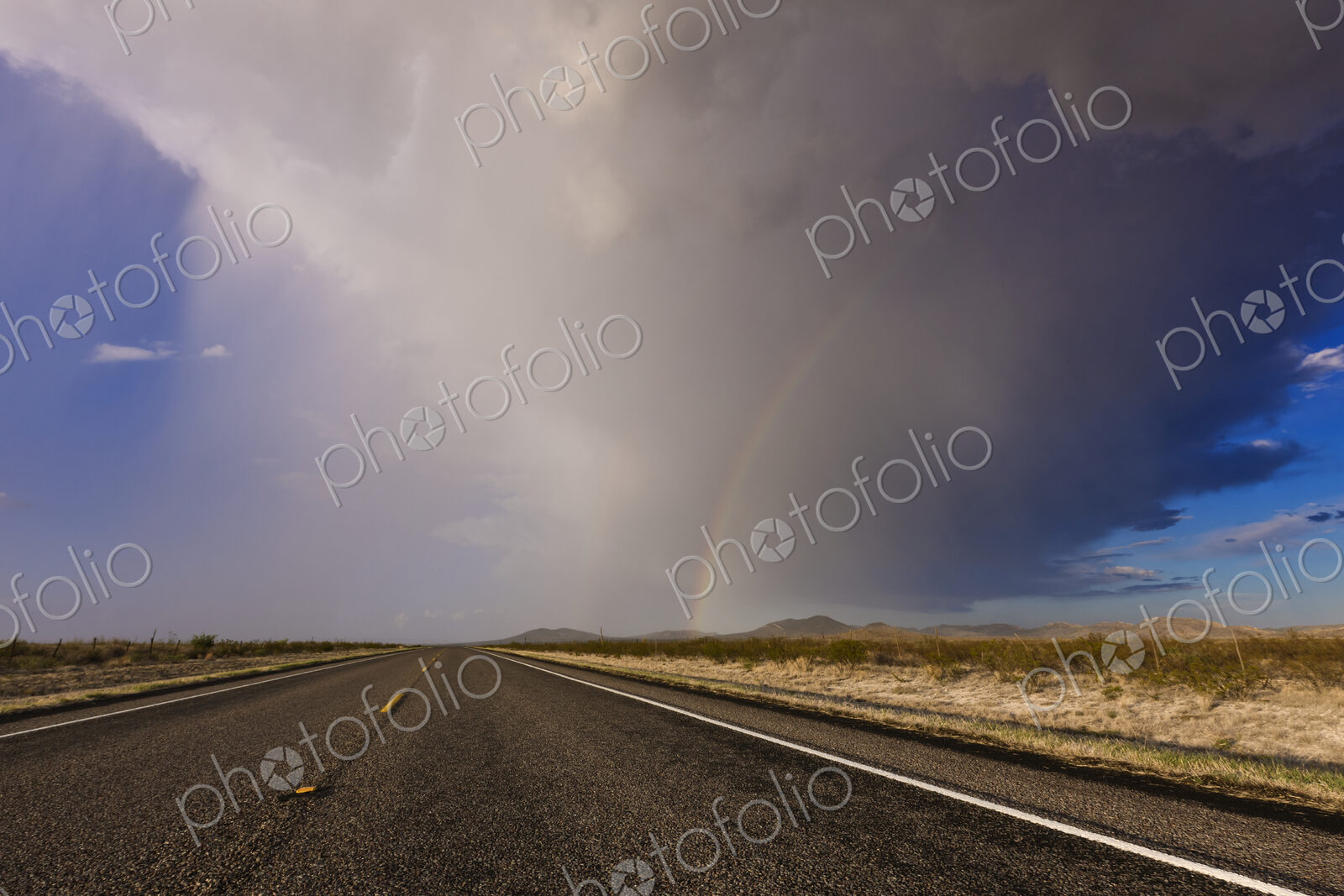 Storm and Rainbow Along the Highway