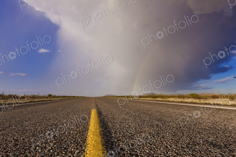 Storm and Rainbow Along the Highway