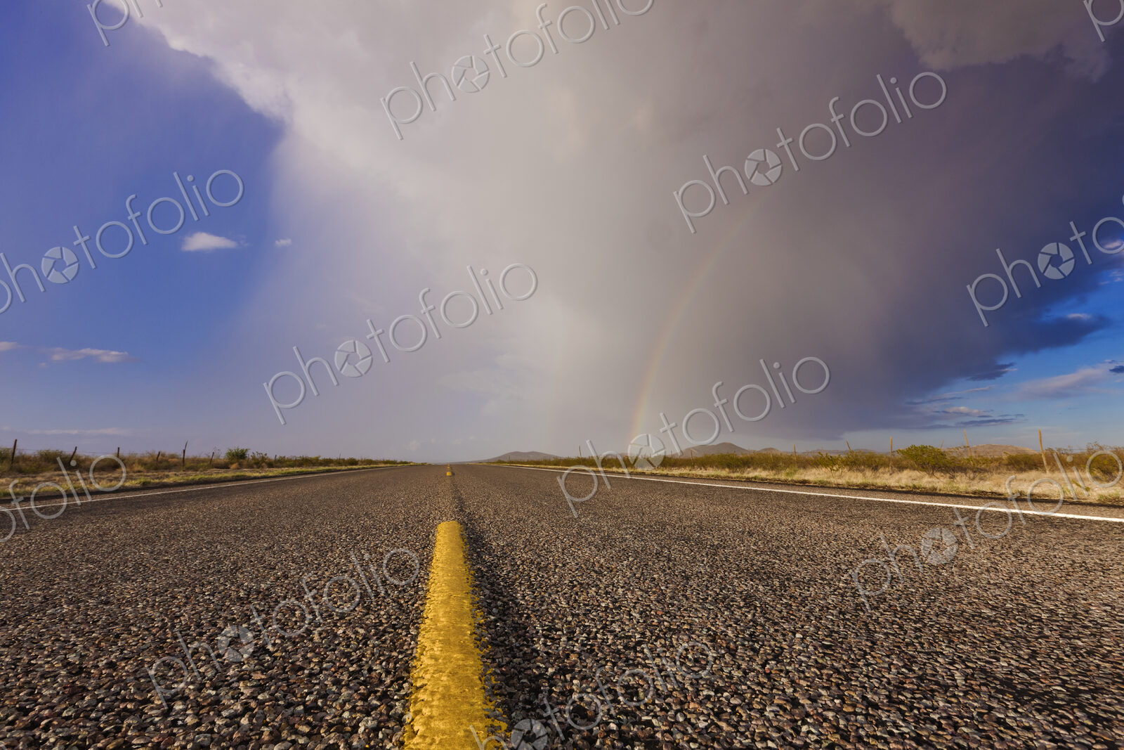 Storm and Rainbow Along the Highway