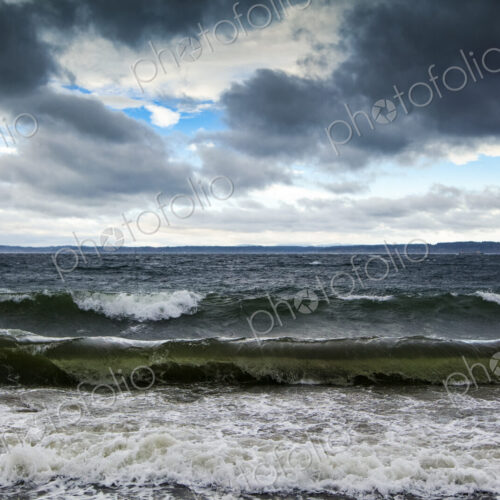 Stormy surf breaking on beach, Strait of Juan de Fuca Stormy surf breaking on beach, Strait of Juan de Fuca