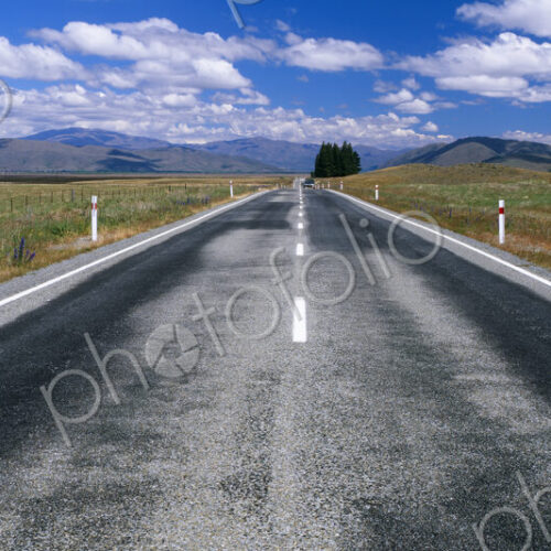 Straight Highway and Fair Weather Cumulus Clouds Straight Highway and Fair Weather Cumulus Clouds