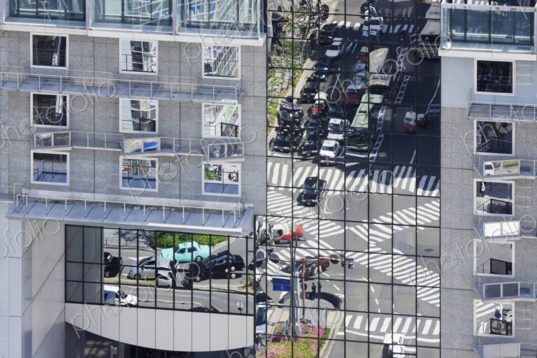 Street Seen Reflected off a Building Surface