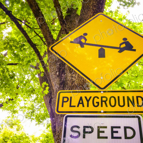 Street sign for a children's playground and speed limit, Spokane, Washington.