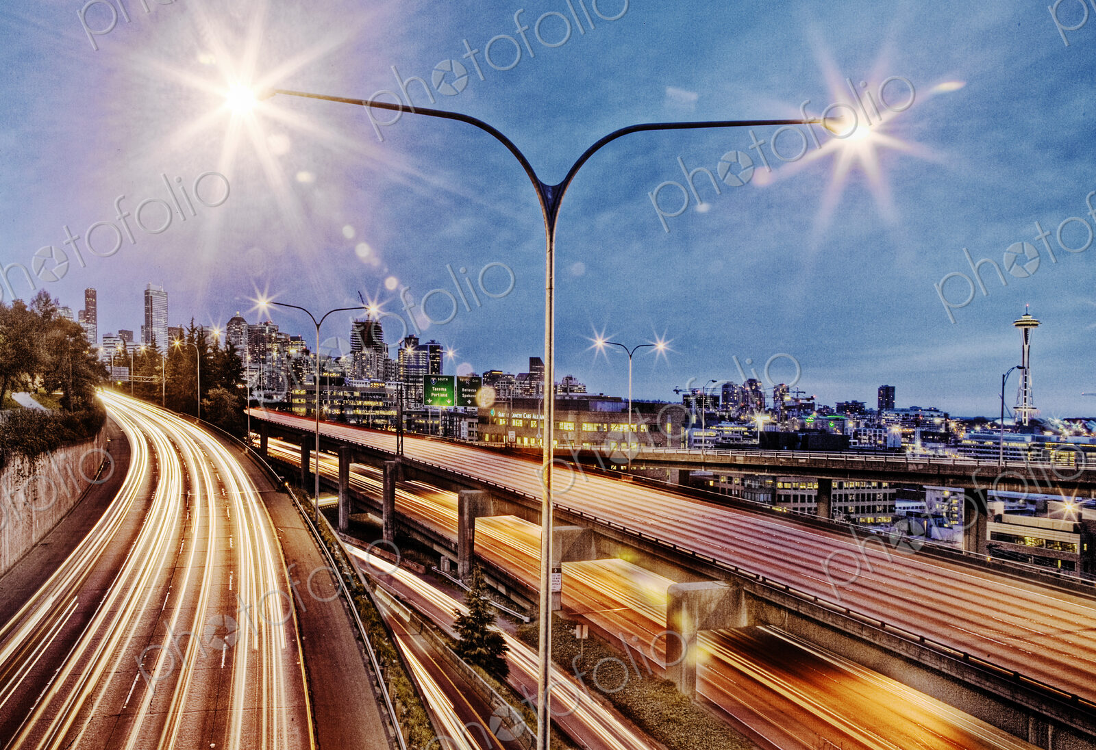 Streetlamp over freeway at night, Seattle, Washington, United States