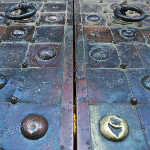Studded Doors With Ring Handles