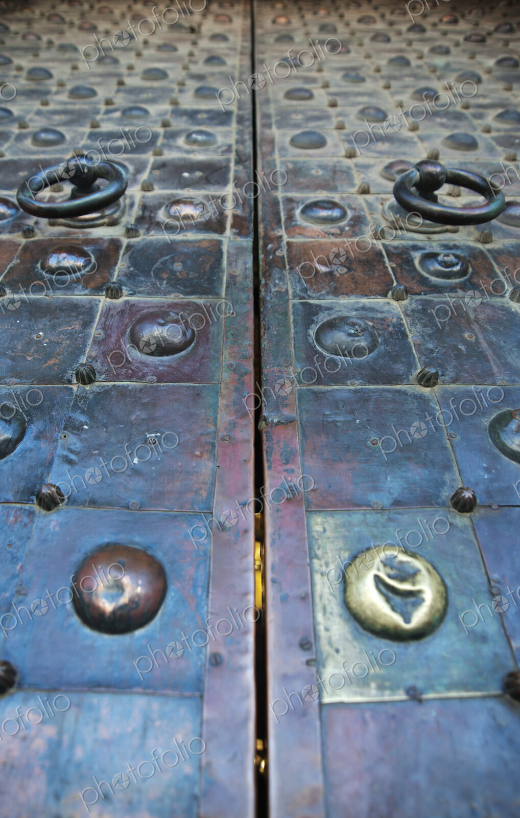Studded Doors With Ring Handles