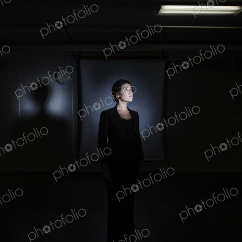 Studio portraits of caucasian woman holding props