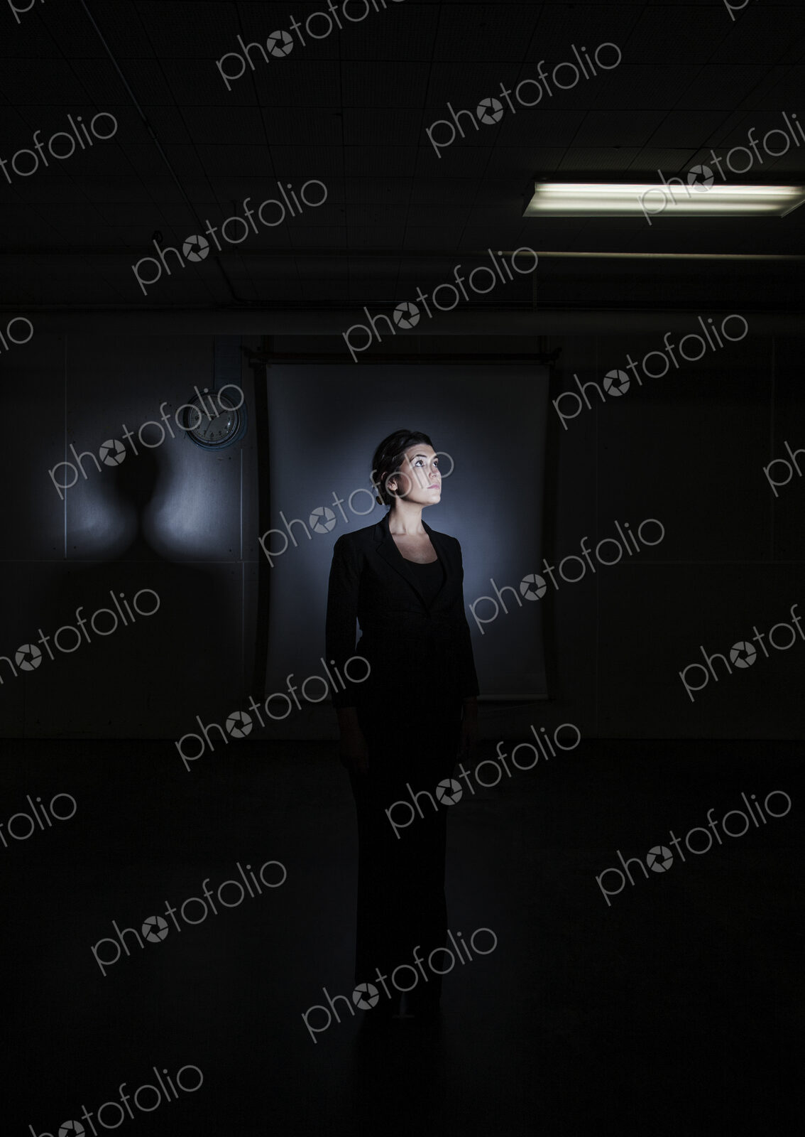 Studio portraits of caucasian woman holding props