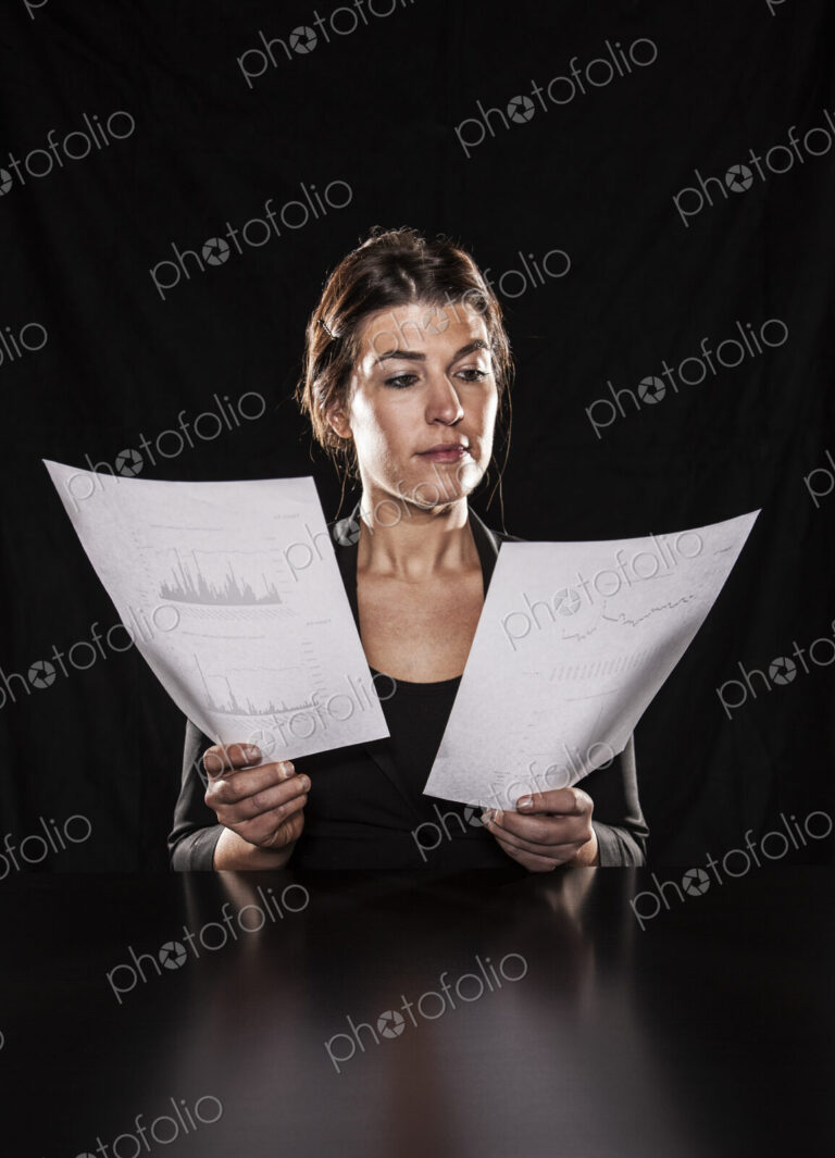 Studio portraits of caucasian woman holding props