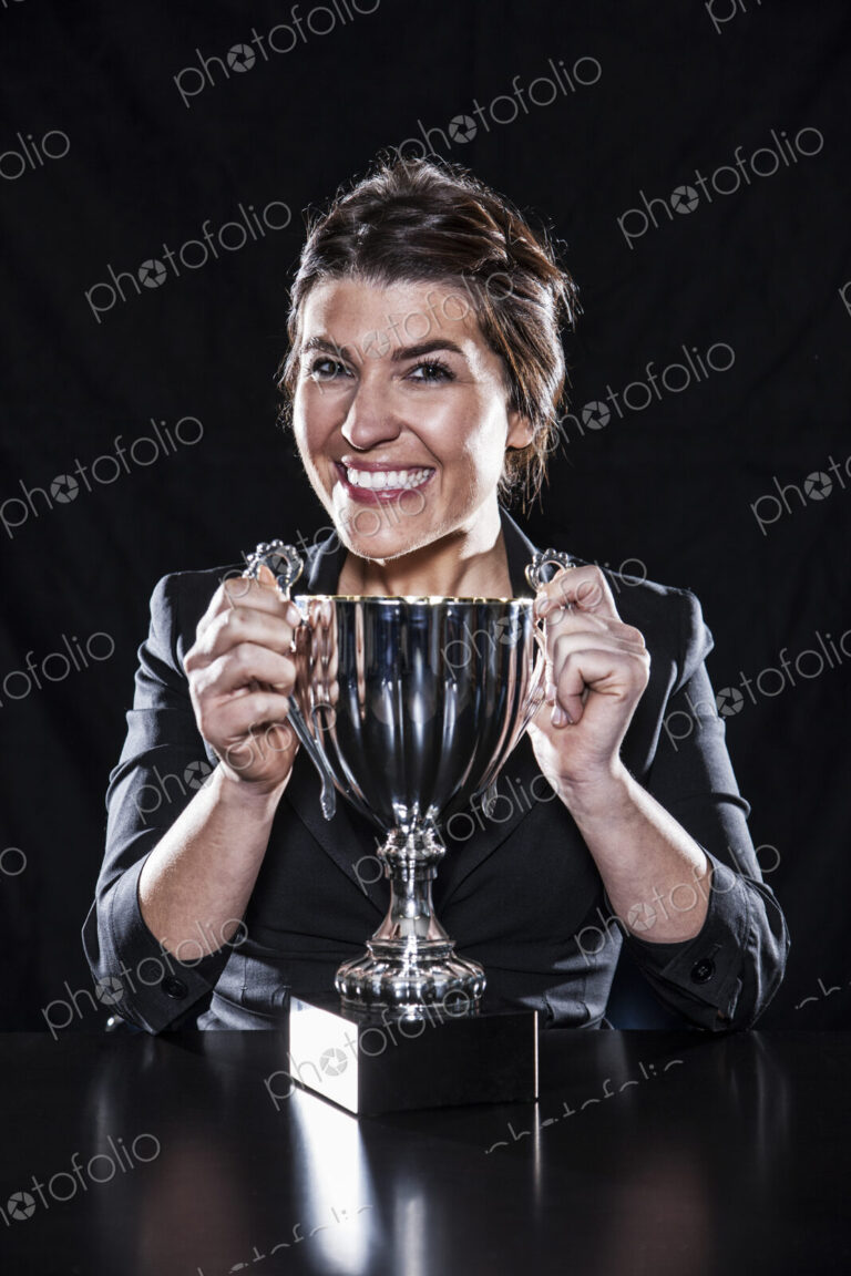 Studio portraits of caucasian woman holding props