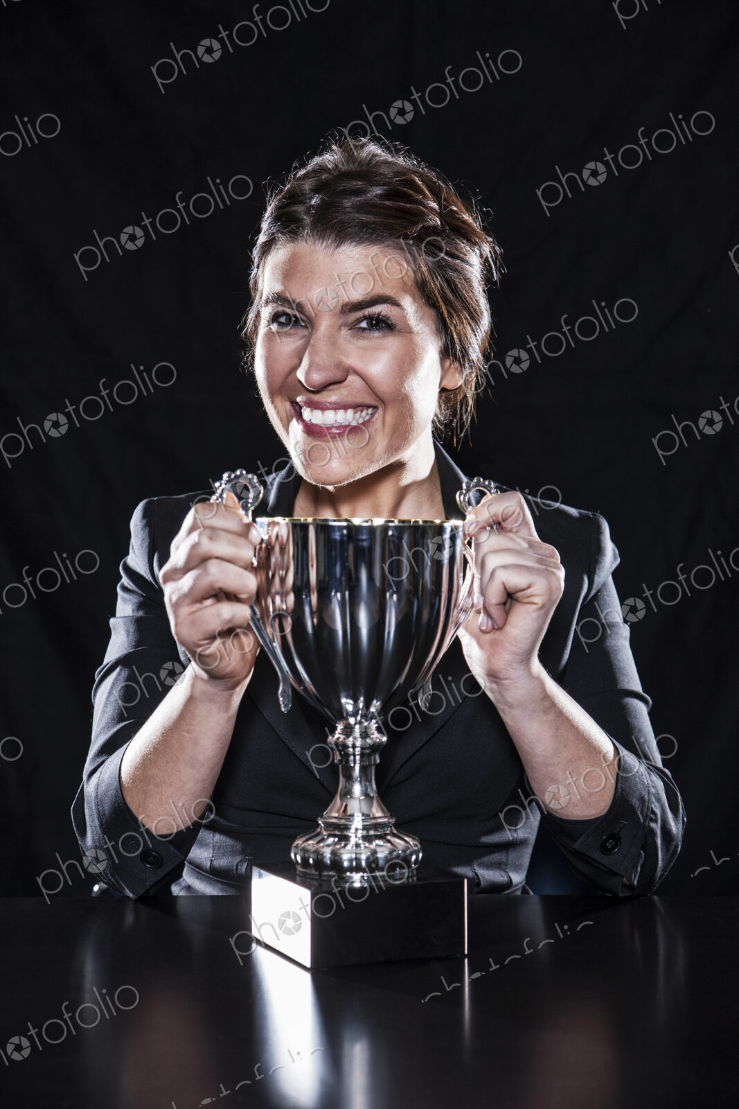 Studio portraits of caucasian woman holding props