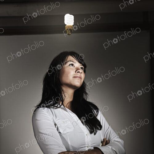 Studio portraits of caucasian woman holding props