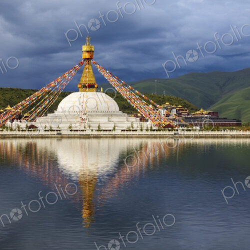 Stupa at the Zhuqing Wujian Zen Forest Monastery, decorated with prayer flags,… Stupa at the Zhuqing Wujian Zen Forest Monastery, decorated with prayer flags,…