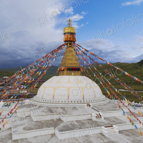 Stupa at the Zhuqing Wujian Zen Forest Monastery, decoration and prayer flags. Stupa at the Zhuqing Wujian Zen Forest Monastery, decoration and prayer flags.