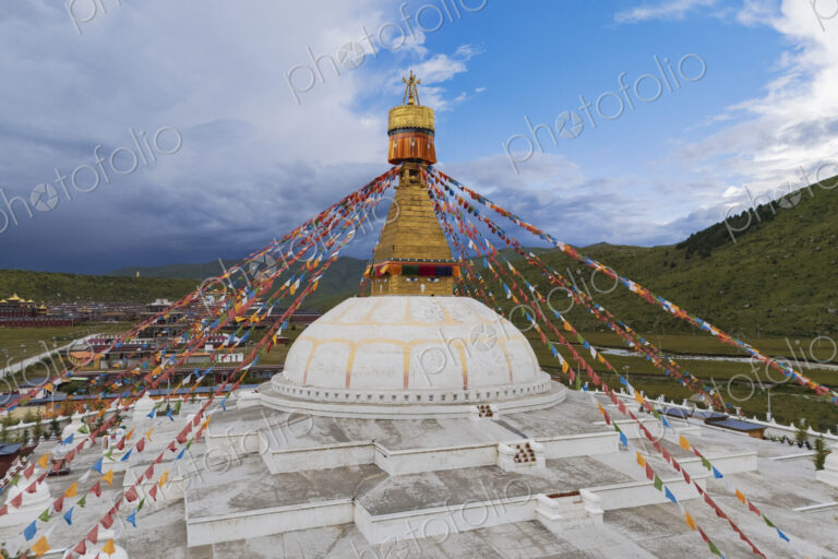 Stupa at the Zhuqing Wujian Zen Forest Monastery, decoration and prayer flags.