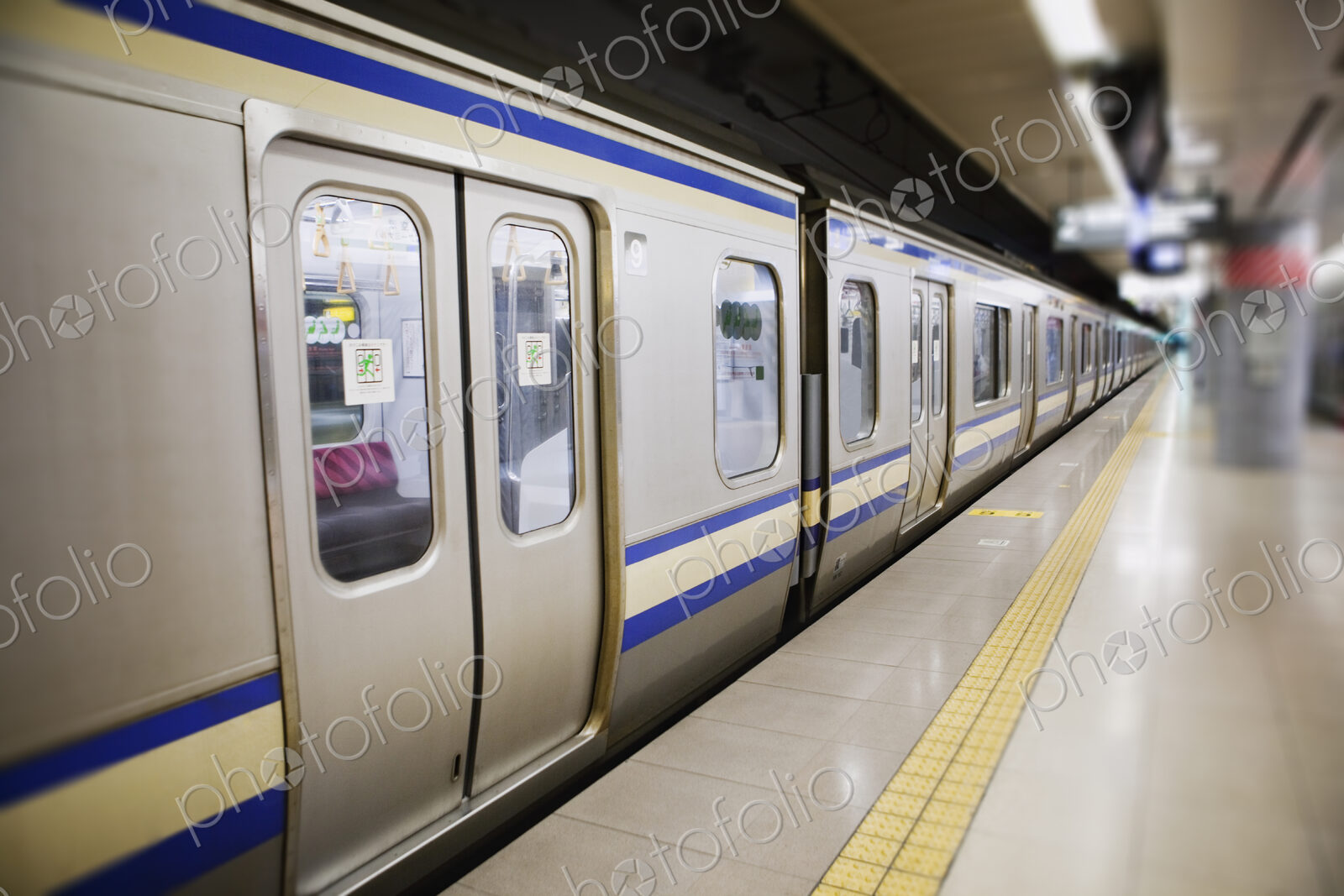 Subway train and platform, Tokyo, Japan.