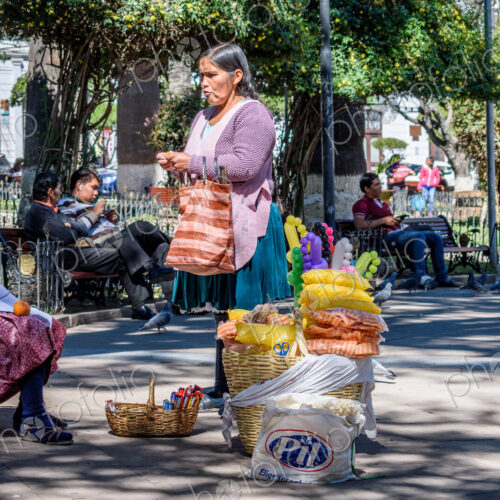 Sucre, the capital city of Bolivia, a square in the city, street vendors with baskets. Sucre, the capital city of Bolivia, a square in the city, street vendors with baskets.