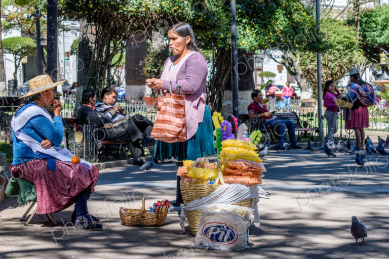 Sucre, the capital city of Bolivia, a square in the city, street vendors with baskets.