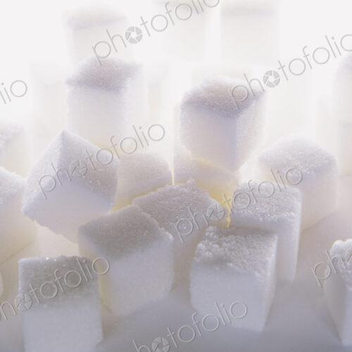 Sugar cubes on white backdrop Sugar cubes on white backdrop