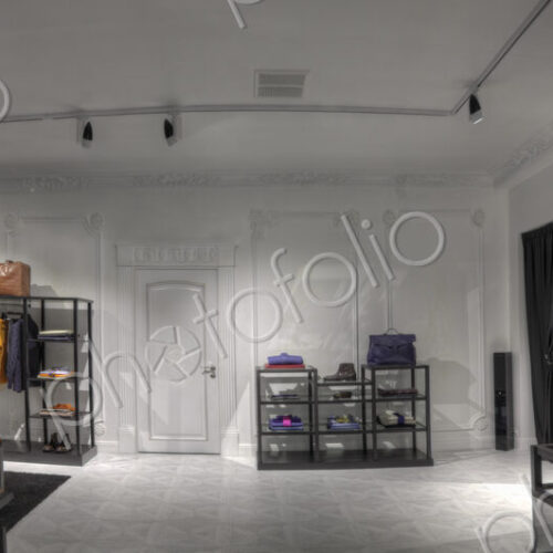 Suits and shoes in clothing store for men Suits and shoes in clothing store for men