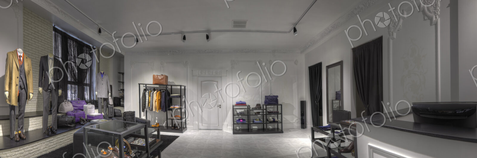 Suits and shoes in clothing store for men
