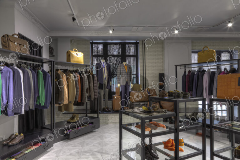 Suits and shoes in clothing store for men
