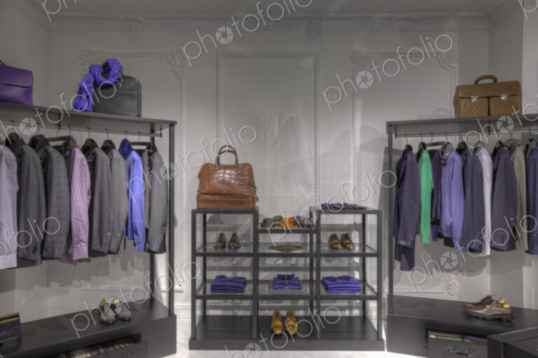 Suits and shoes in clothing store for men