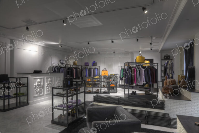 Suits and shoes in clothing store for men