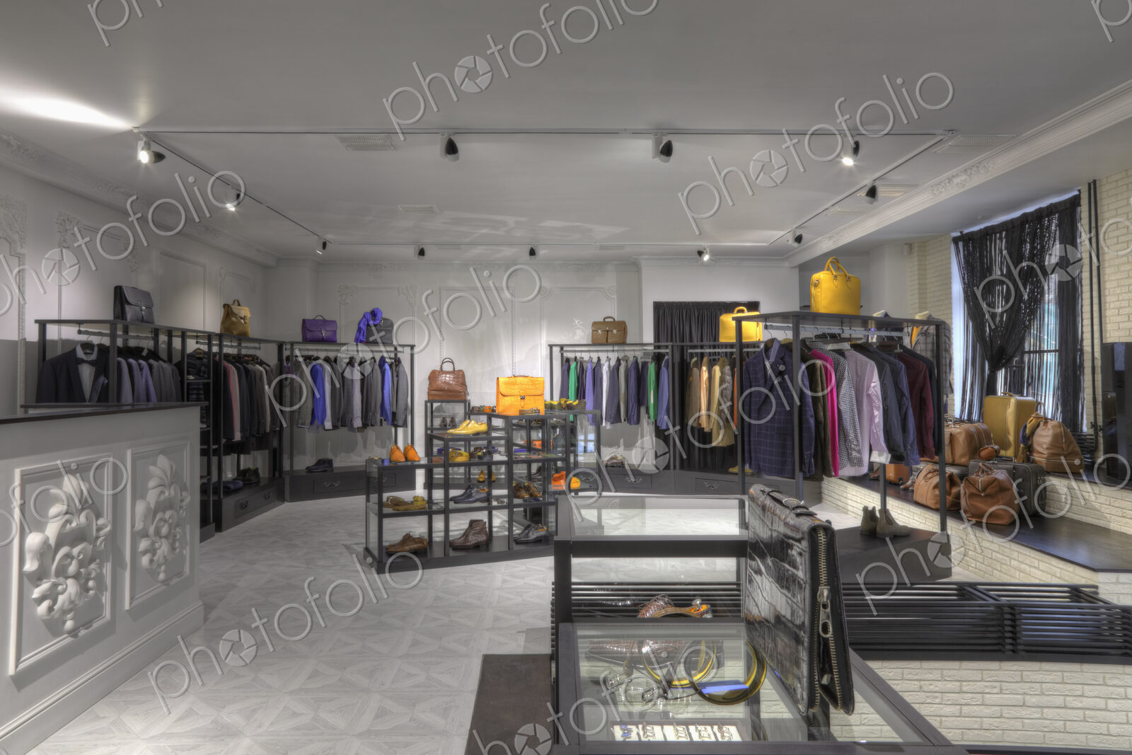 Suits and shoes in clothing store for men