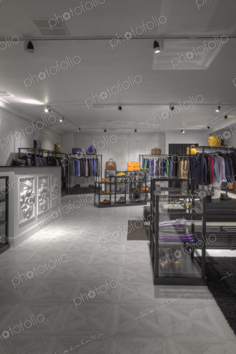 Suits and shoes in clothing store for men