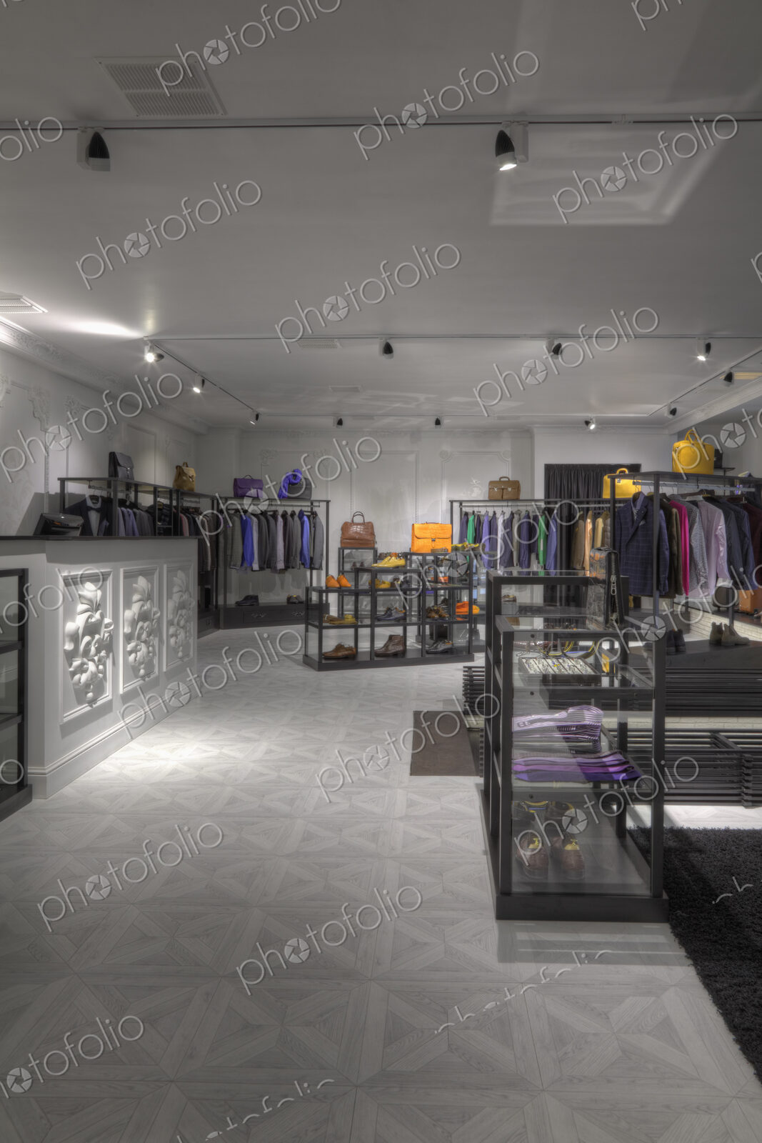 Suits and shoes in clothing store for men