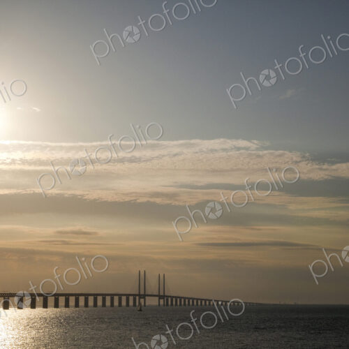 Sun in sky over Oresund Bridge, Malmo, Sweden
