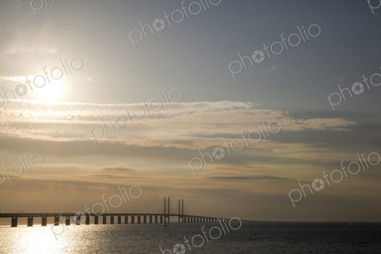 Sun in sky over Oresund Bridge, Malmo, Sweden