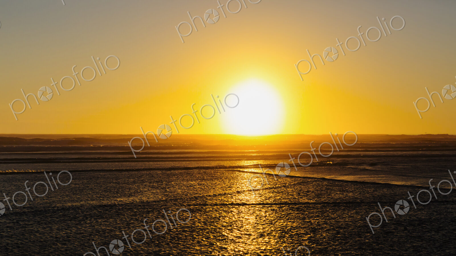 Sun setting over Grayland Beach, Tokeland.