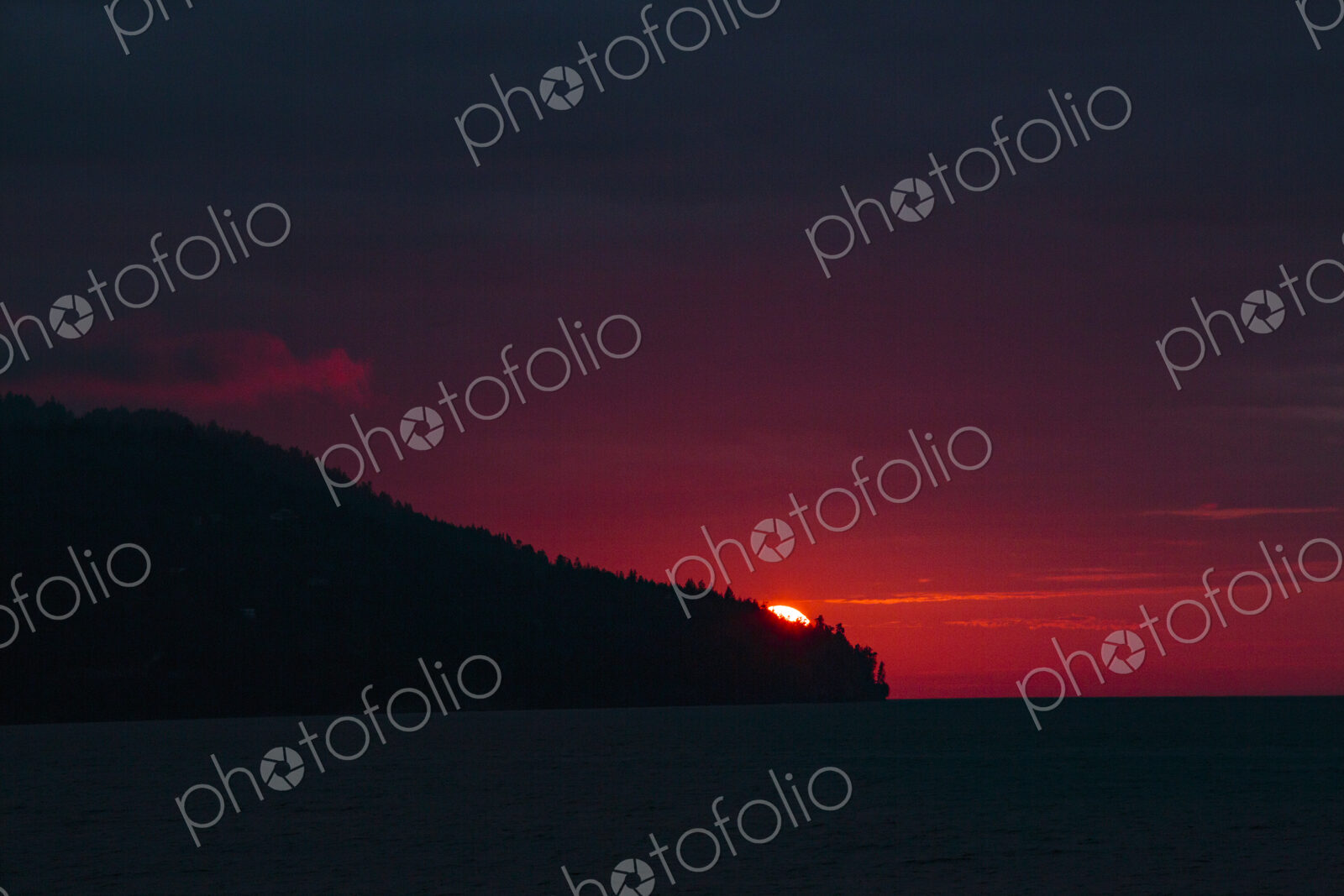 Sun setting over Striped Peak, Port Angeles, WA USA