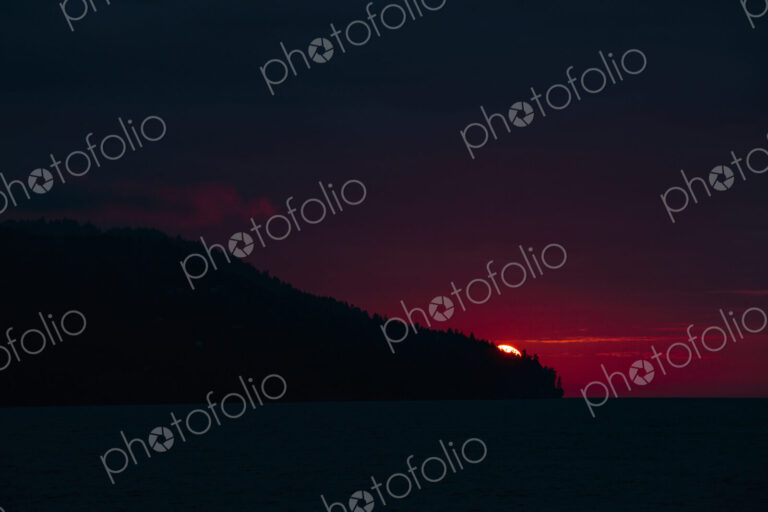 Sun setting over Striped Peak, Port Angeles, WA USA
