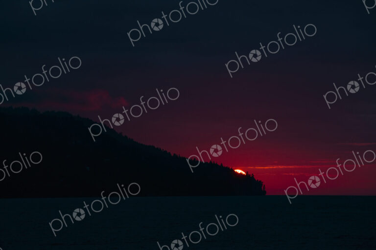 Sun setting over Striped Peak, Port Angeles, WA USA