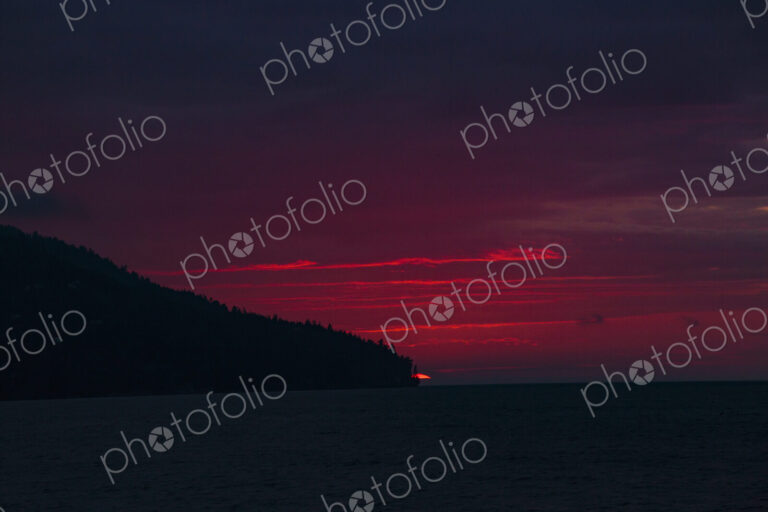 Sun setting over Striped Peak, Port Angeles, WA USA